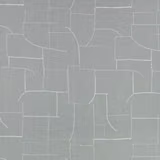Muted blue-grey fabric with fine white embroidered geometric blocks and curved lines