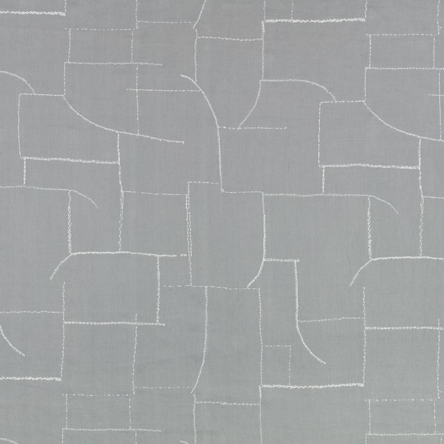 Muted blue-grey fabric with fine white embroidered geometric blocks and curved lines