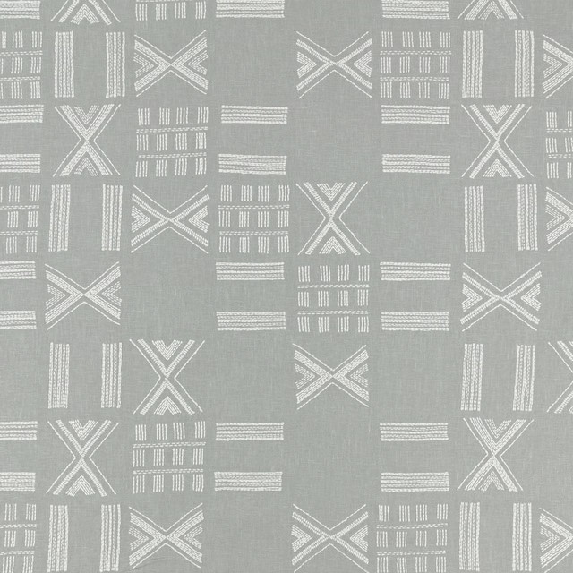 Cool blue-grey embroidered ground with ivory Xs, bars and striped geometric blocks