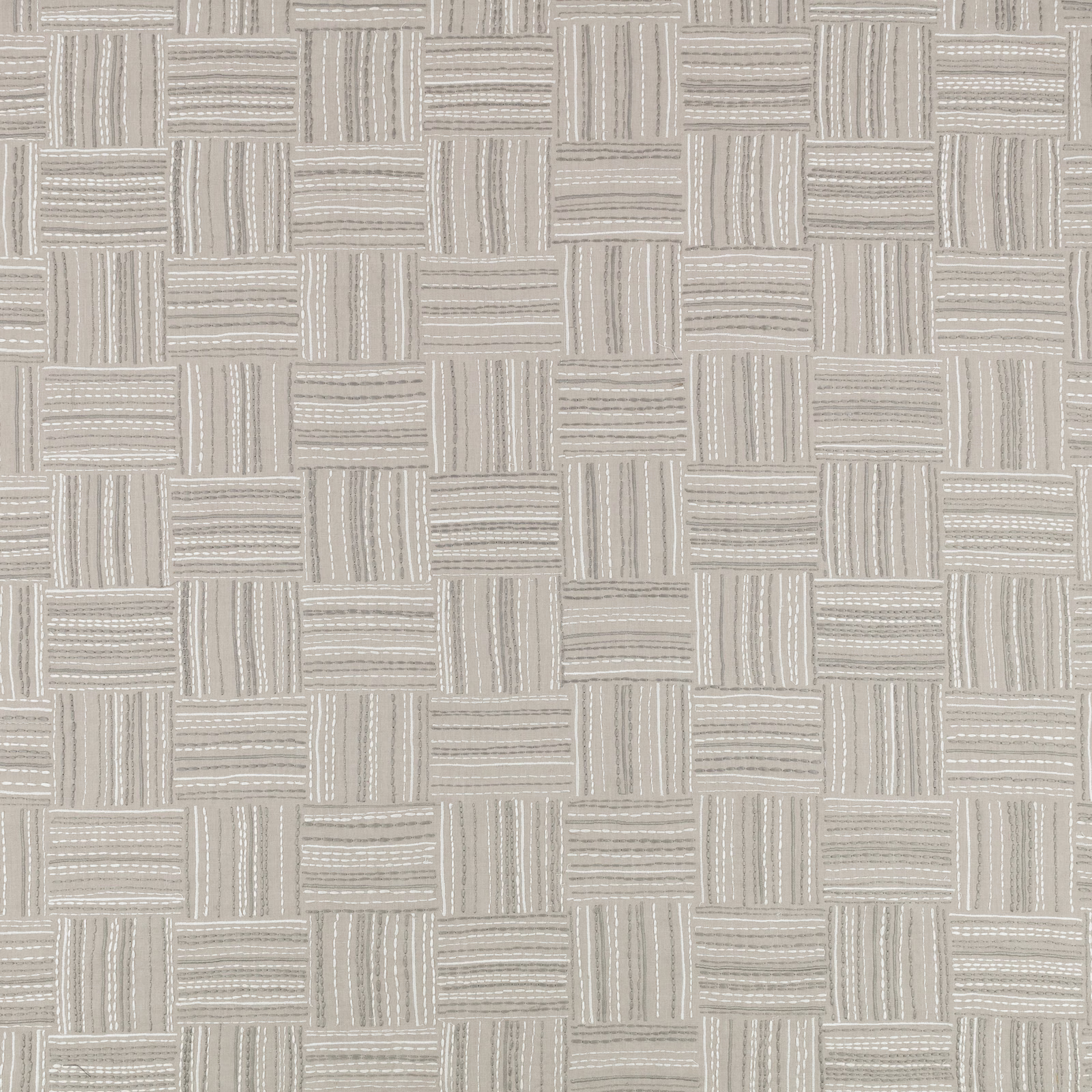 Pale flax-beige textile with alternating horizontal and vertical ribbed blocks
