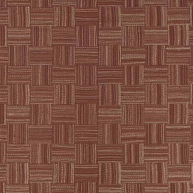 Warm sienna-brown fabric with cream embroidered lines forming a staggered rectangular grid