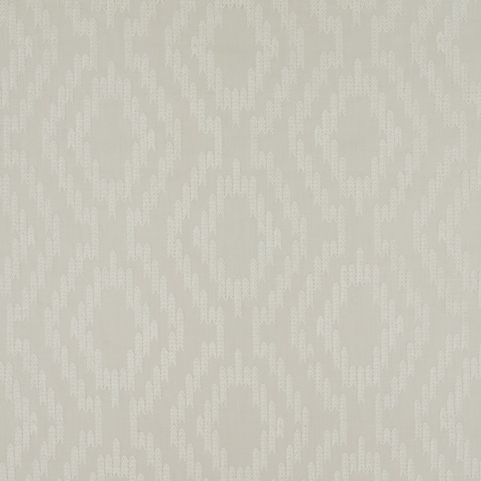 Pale sage-grey textile with white embroidered branching motifs in an irregular vertical repeat