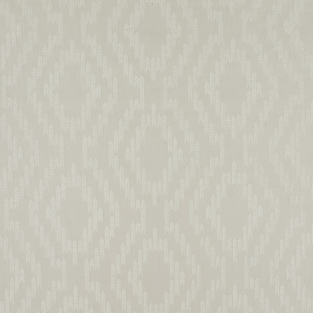 Pale sage-grey textile with white embroidered branching motifs in an irregular vertical repeat