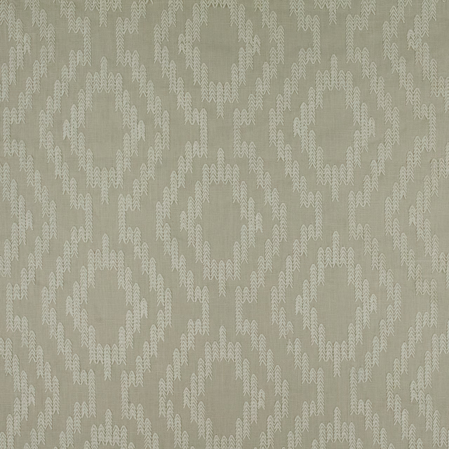 Muted silvery sage fabric with pale branching chevrons and a softly woven ground
