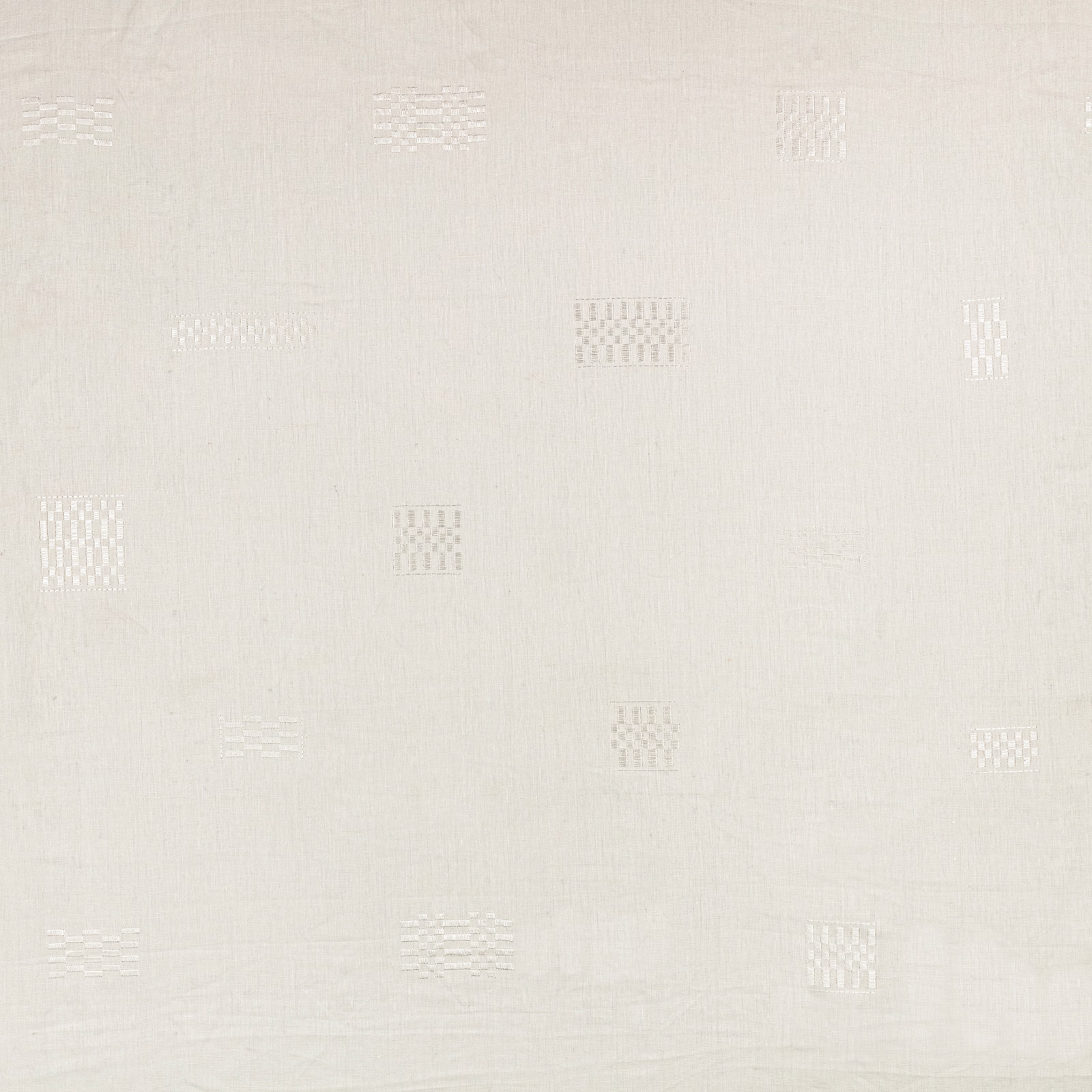 Soft ivory white fabric with tiny woven rectangular motifs and fine texture