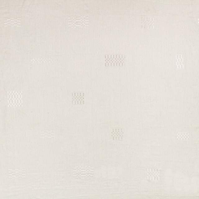 Soft ivory white fabric with tiny woven rectangular motifs and fine texture