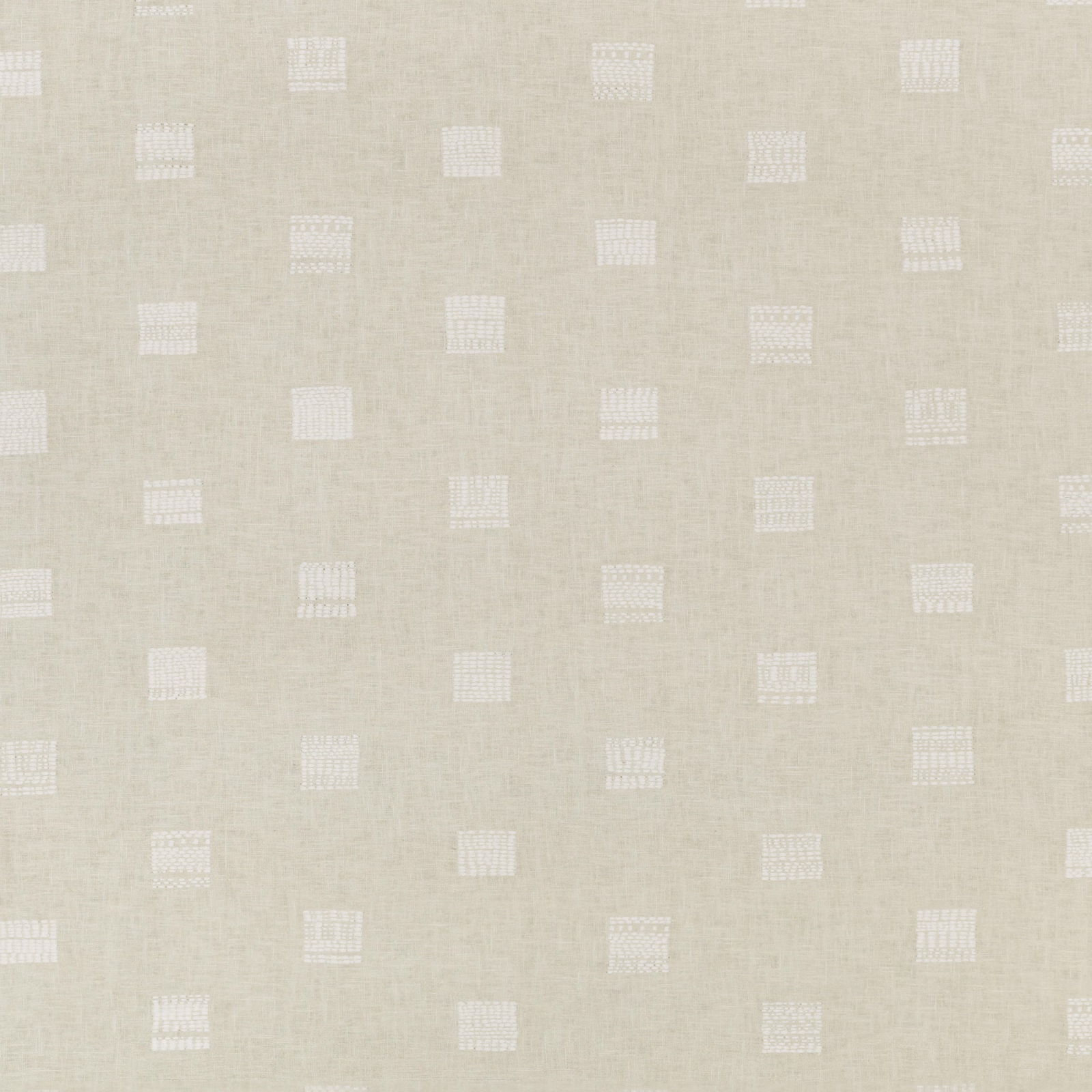 Warm sand-beige textile with scattered white square grid motifs and subtle woven texture