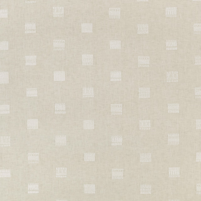 Warm sand-beige textile with scattered white square grid motifs and subtle woven texture