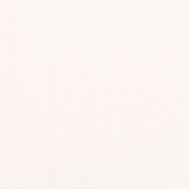 Warm white sheer with faint vertical grain and delicate dappled texture
