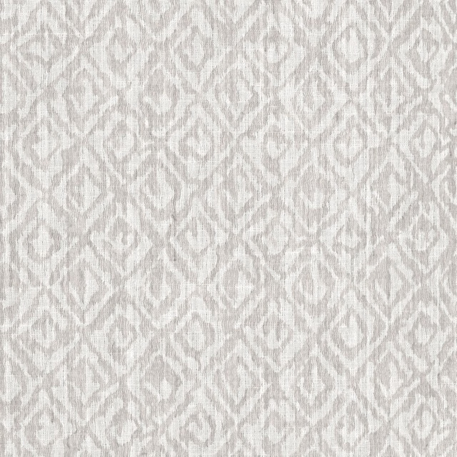 Pale grey mist fabric with blurred ivory ikat motifs and fine texture