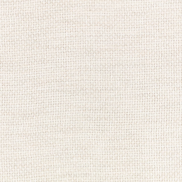 Close view of pale vellum-cream fabric with a fine grey-flecked woven grid