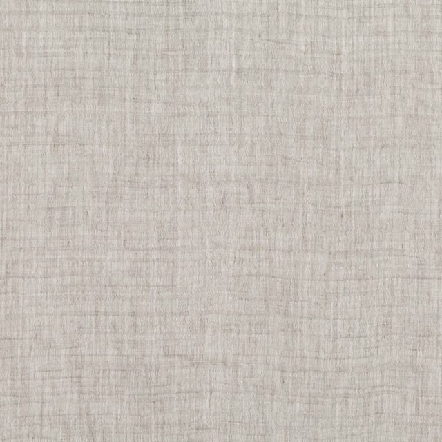 Close-up of pale mist-grey sheer with fine crosshatched woven texture