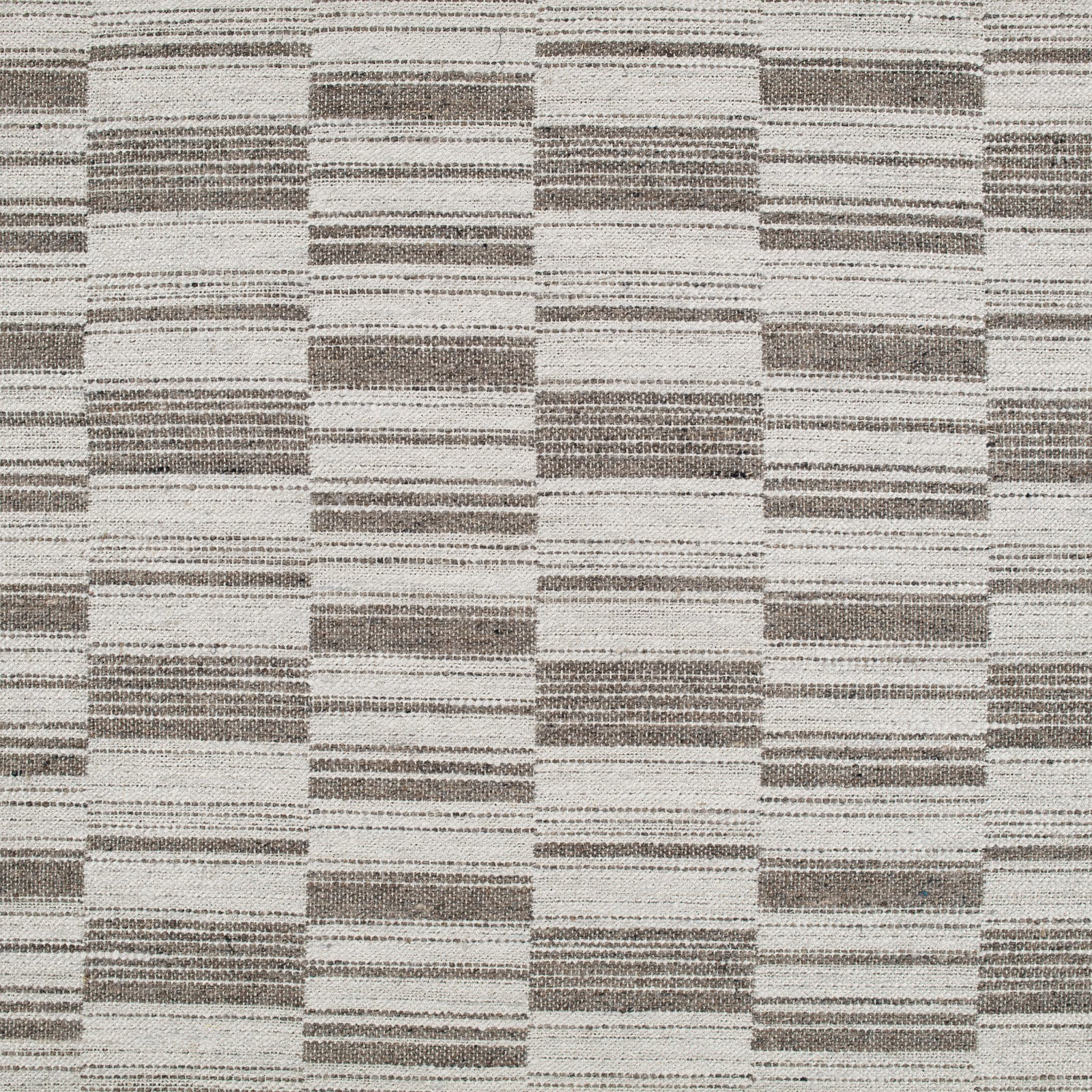 Cool gunmetal and ivory woven textile with staggered horizontal rectangular bands