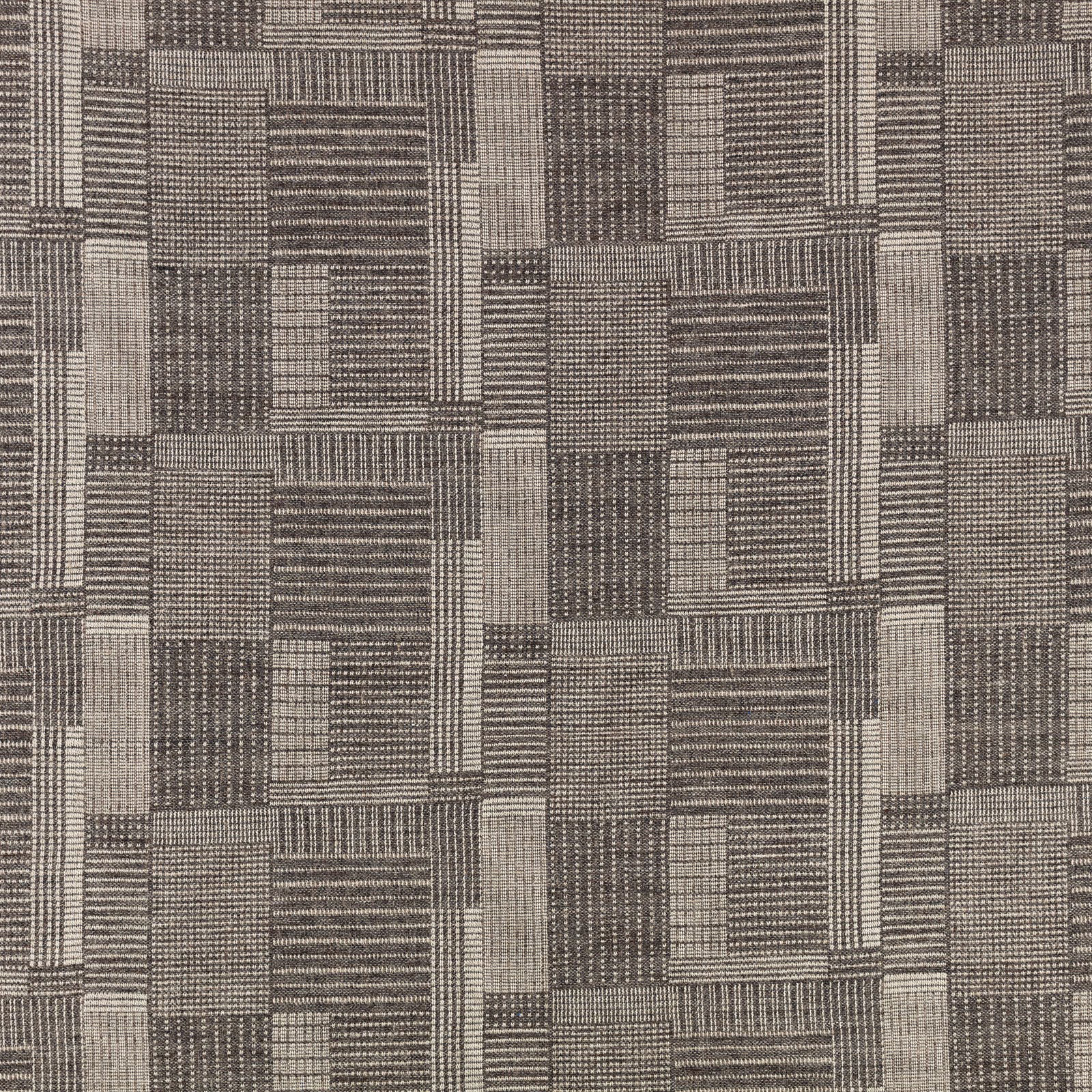 Cool gunmetal-grey textile with interlocking striped and checked rectangular woven blocks
