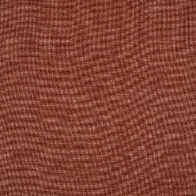 Warm carnelian terracotta textile with a fine, subtly irregular plain weave