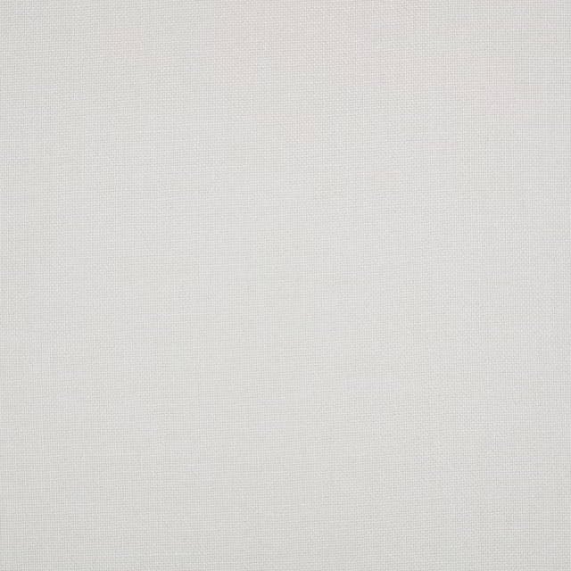 Close-up of cool snow-white fabric with a fine, subtle plain weave texture