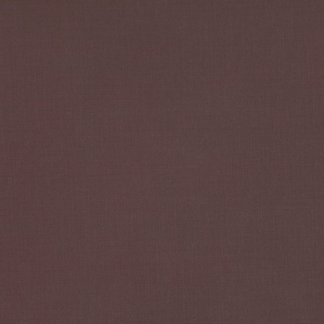 Close-up of dark fig-plum plain weave with subtle brown warmth