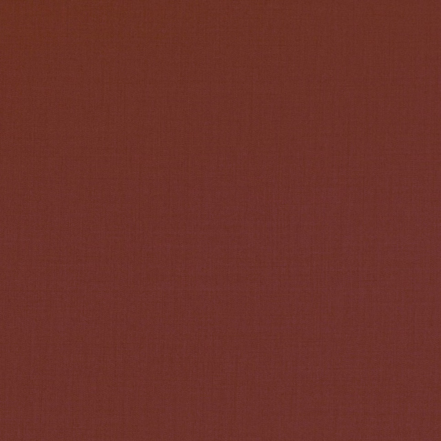 Warm russet red-brown plain woven fabric with subtle crosshatched texture