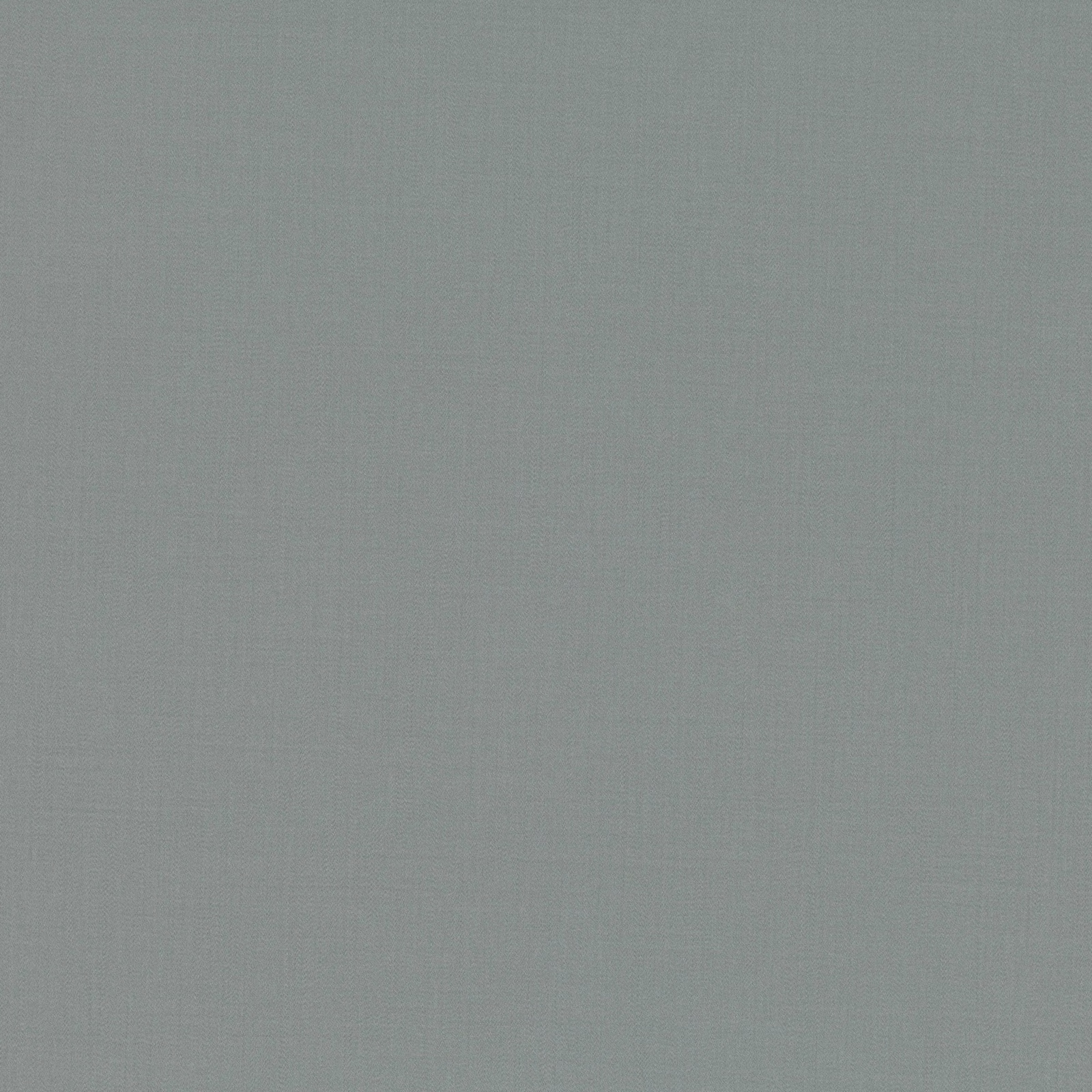 Close-up of muted blue-grey plain woven fabric with a soft sage cast