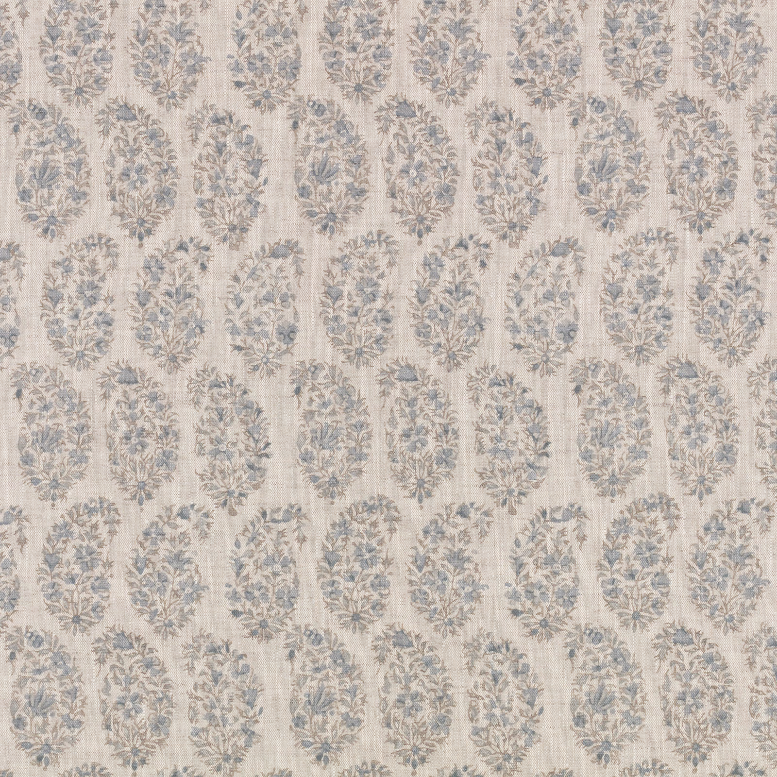 Pale cream textile with dusty blue floral medallions and grey-beige botanical detail
