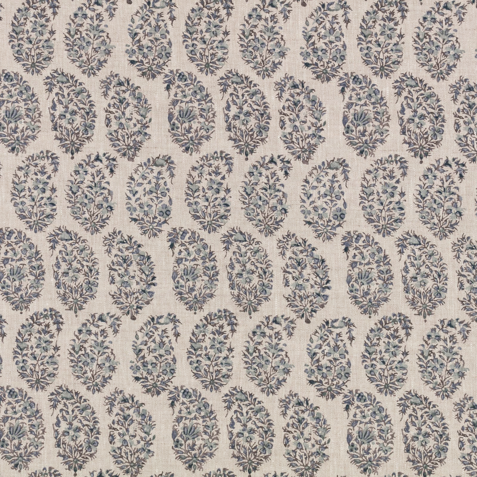 Cream textile with repeating muted indigo botanical medallions and leafy floral detail