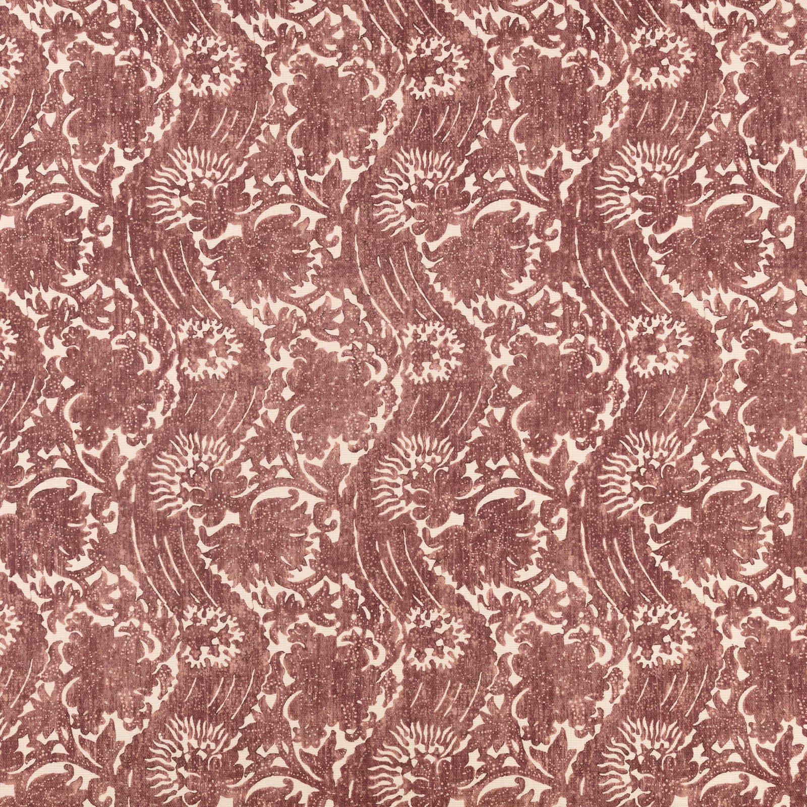 Warm sienna floral repeat on a cream, softly textured textile ground