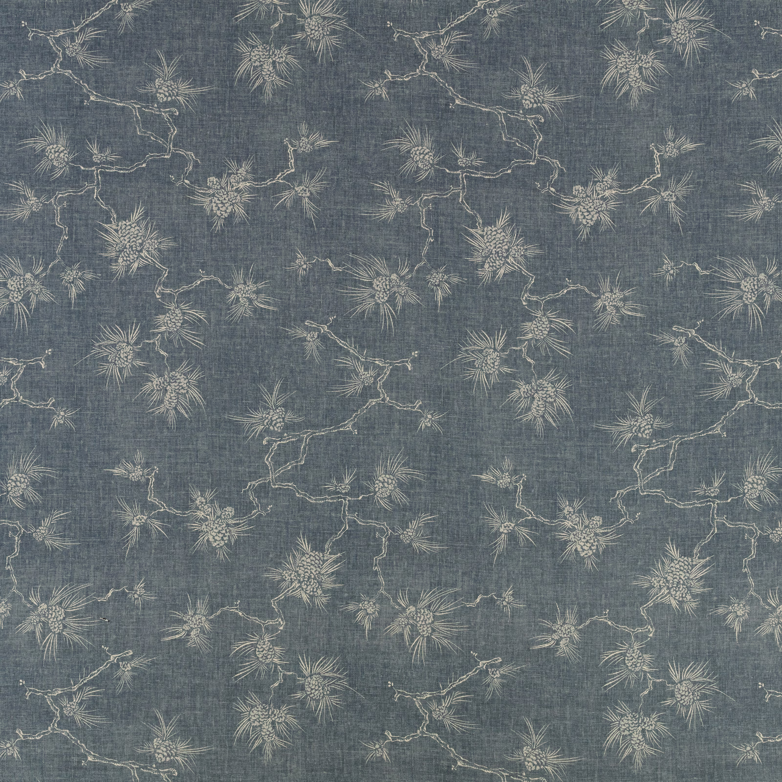 Blue-grey indigo fabric with pale botanical sprays and fine crosshatched texture