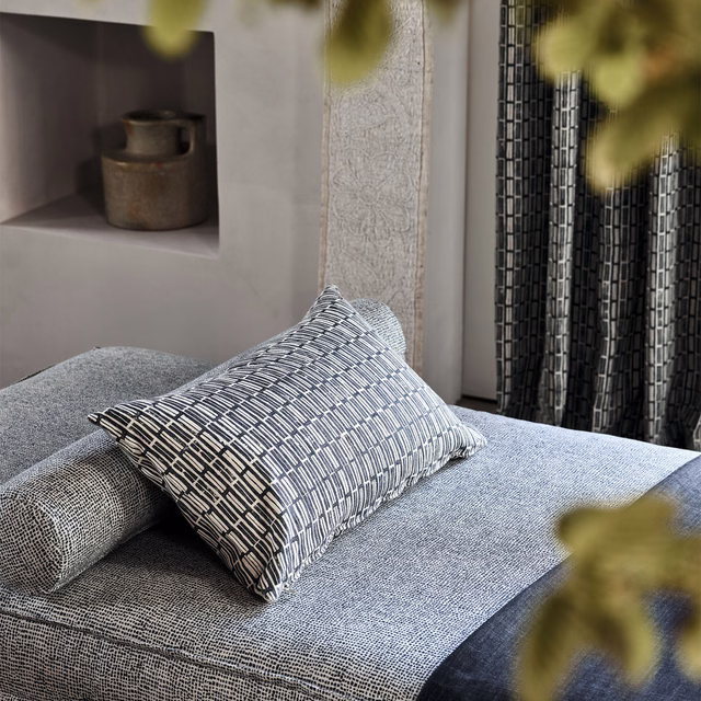 Blue-grey Scatter Ocean cushion with fine cream broken-line pattern and woven texture