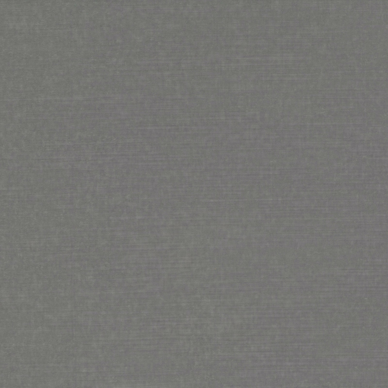 Close-up of muted ash grey velvet with a fine, softly brushed pile
