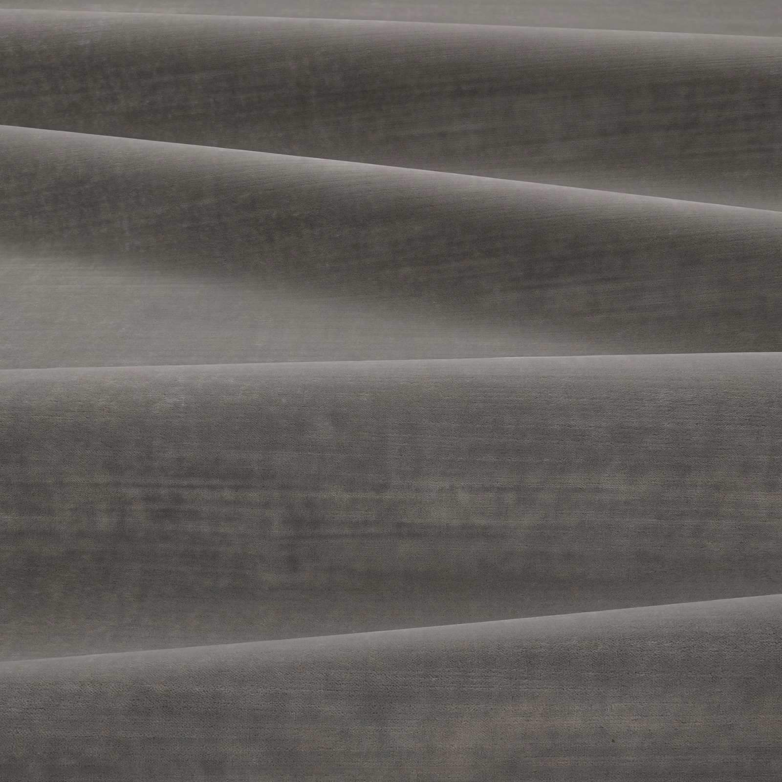Smoky stone-grey velvet showing brushed sheen and tonal folds
