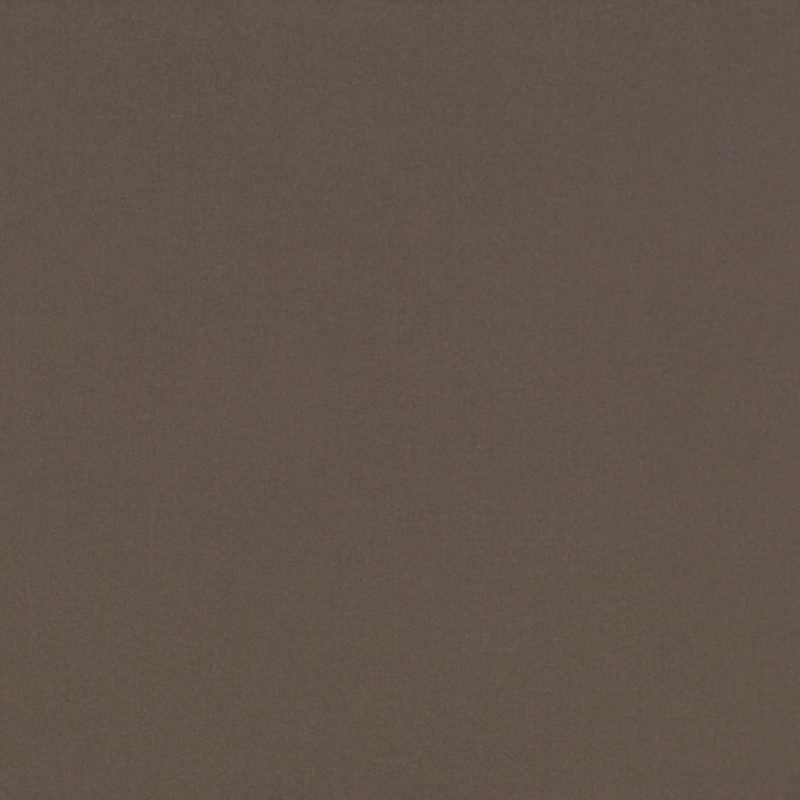 Close-up of warm chestnut-brown velvet with a soft, subtly shifting plain pile