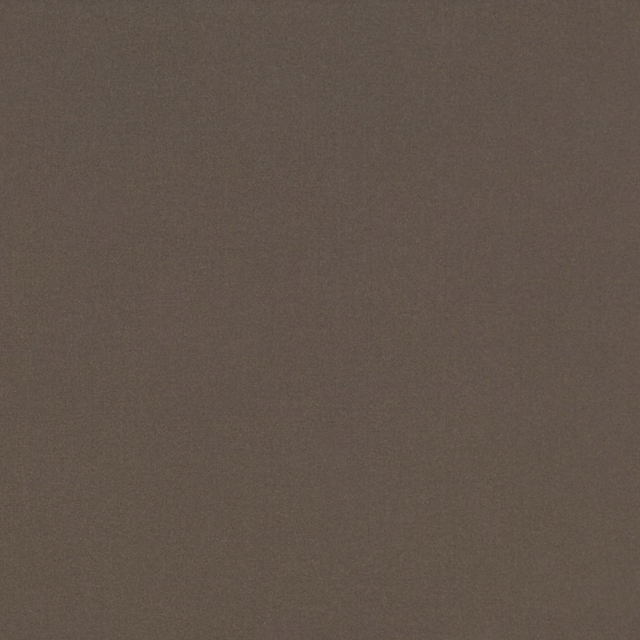 Close-up of warm chestnut-brown velvet with a soft, subtly shifting plain pile