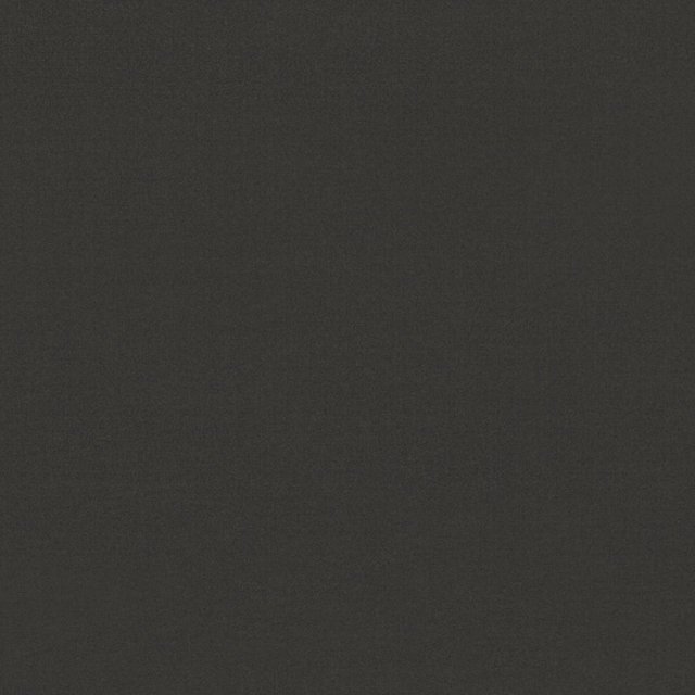 Close-up of deep charcoal-grey velvet with a subtle, light-catching pile