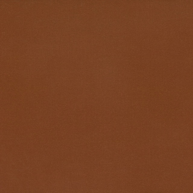 Close-up of plain burnt saffron-orange velvet with a softly brushed, subtly lustrous pile