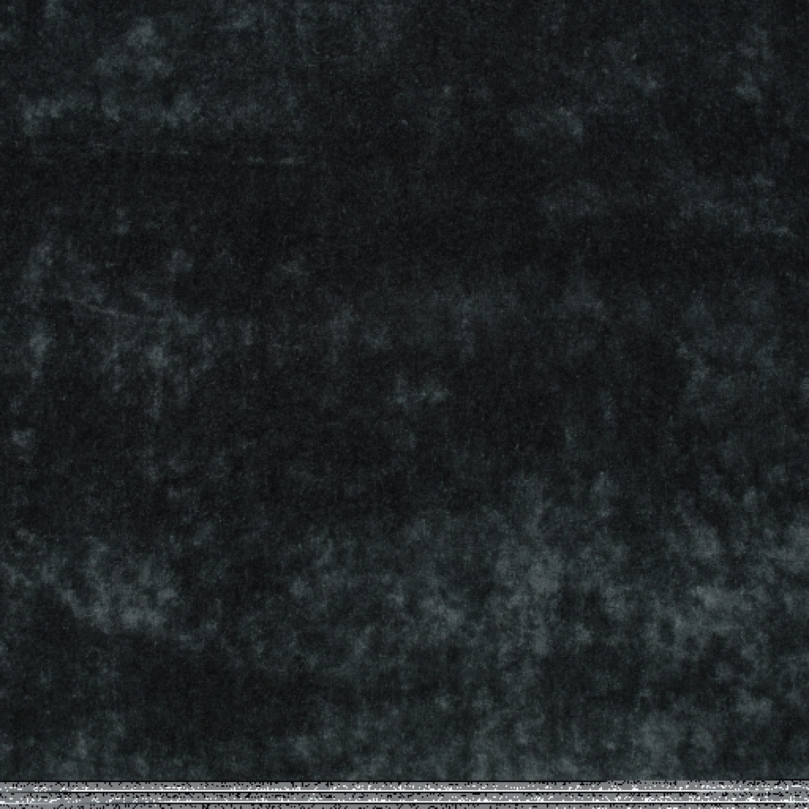Mottled charcoal-mole velvet with smoky grey highlights across its plush surface