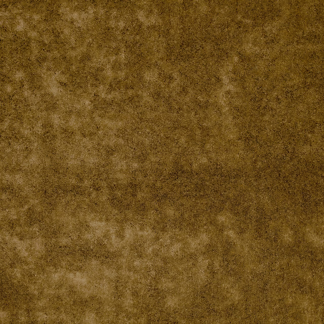 Mottled ochre-brown velvet with golden highlights and a softly clouded nap