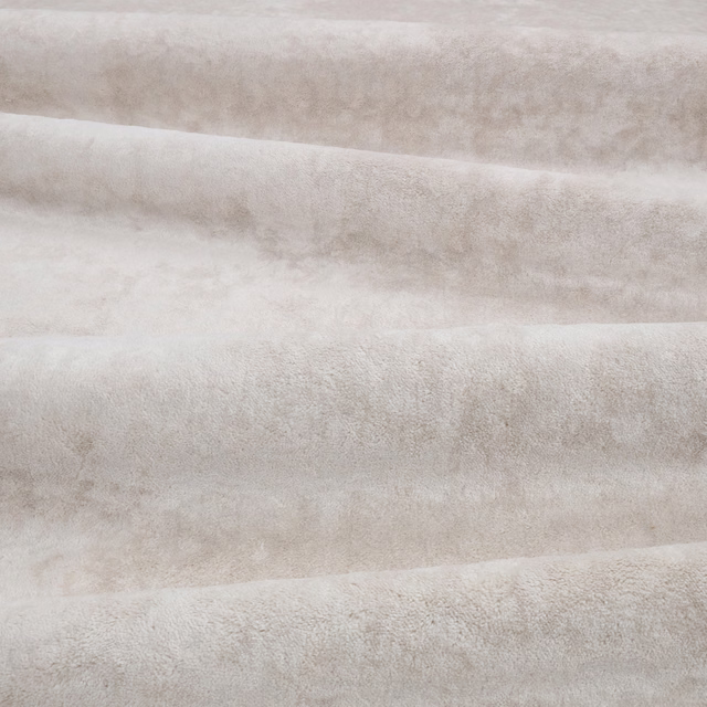 Pale plaster taupe velvet with softly mottled nap and horizontal folded bands