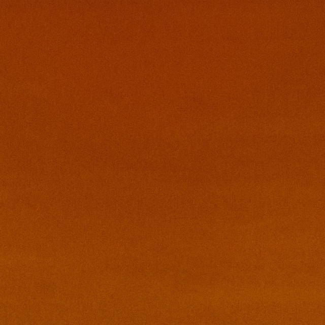 Deep burnt orange velvet swatch with a soft, subtly directional nap