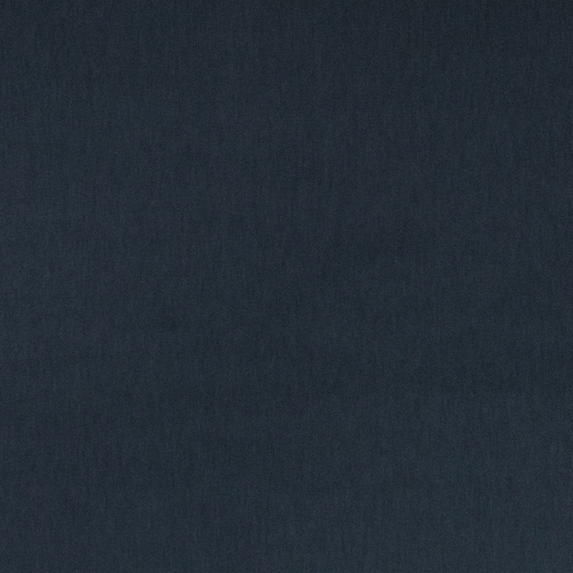 Deep ink-blue velvet with a softly brushed nap and subtle tonal variation
