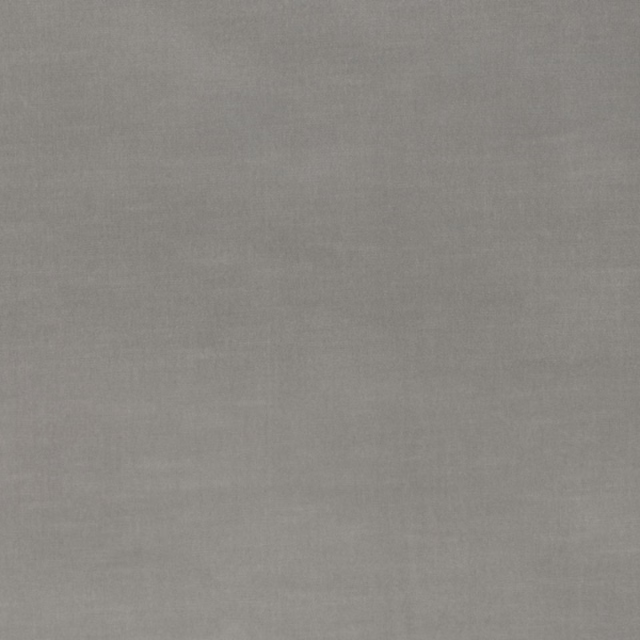 Close-up of smooth mid-grey velvet with a softly brushed, low-sheen surface
