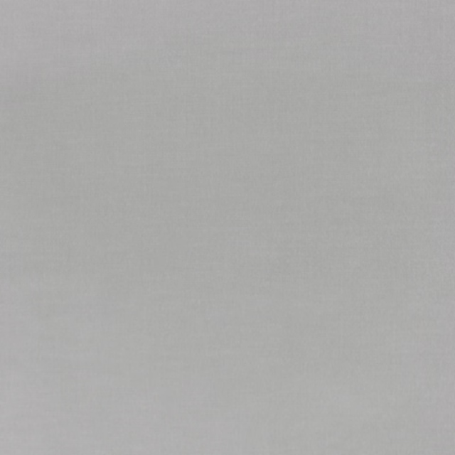 Pale silver-grey velvet swatch showing a smooth nap and subtle tonal sheen