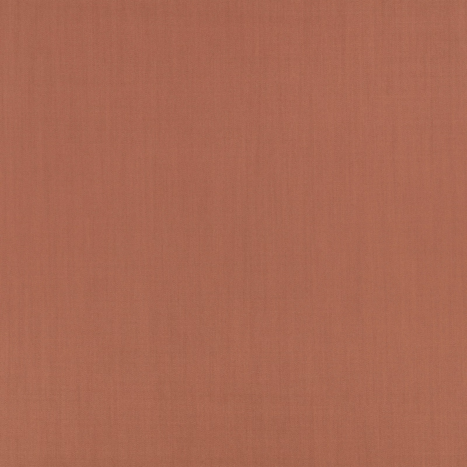 Muted terracotta plain weave with subtle vertical grain and softly shaded surface