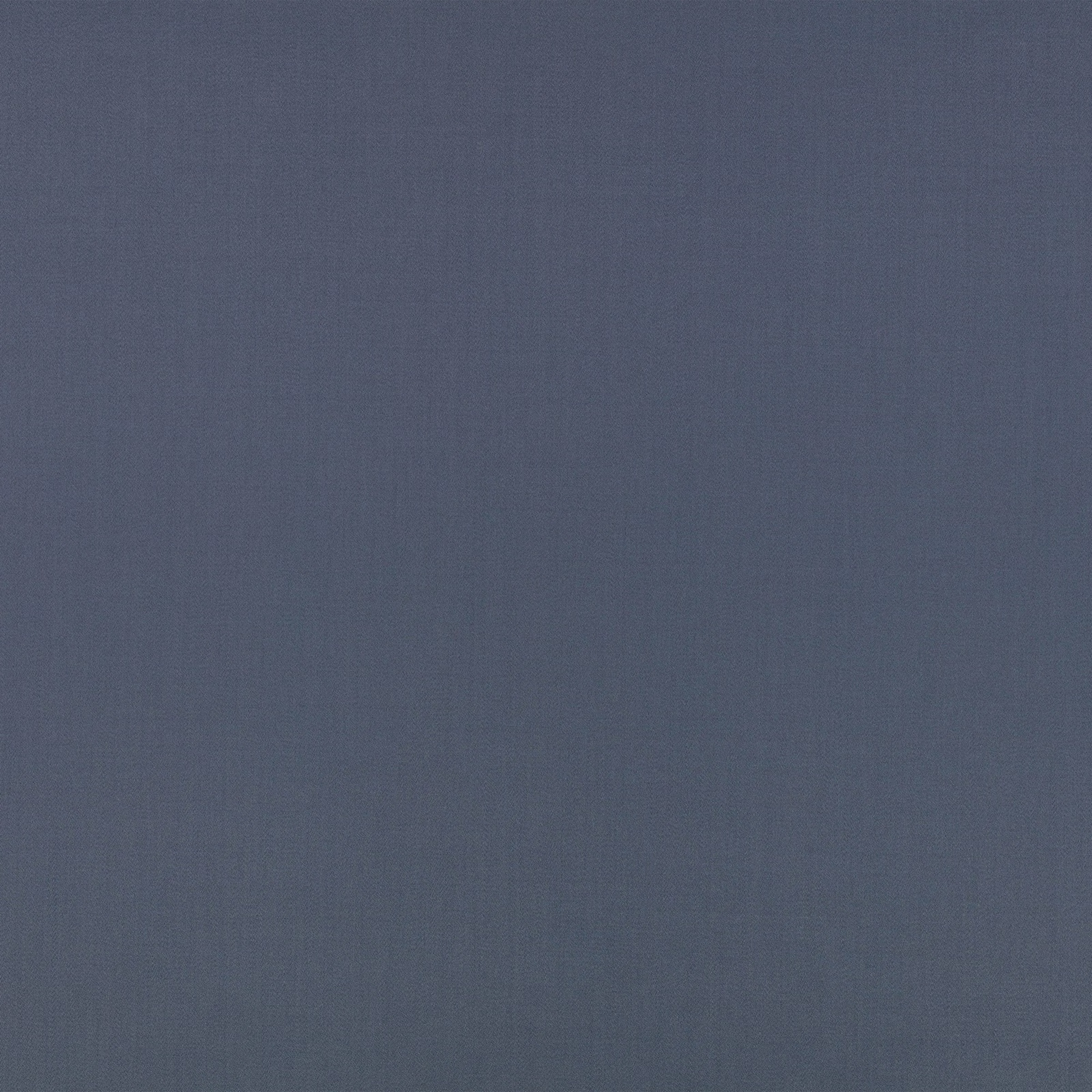 Muted blue-grey indigo fabric with a close weave and subtle vertical texture