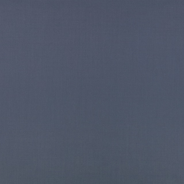 Muted blue-grey indigo fabric with a close weave and subtle vertical texture