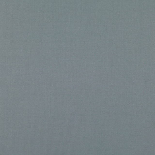 Close-up of muted blue-grey Town Lead fabric showing a fine plain woven texture