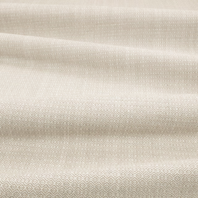 Folded M671 Sepia fabric with a warm taupe diamond lattice and woven texture