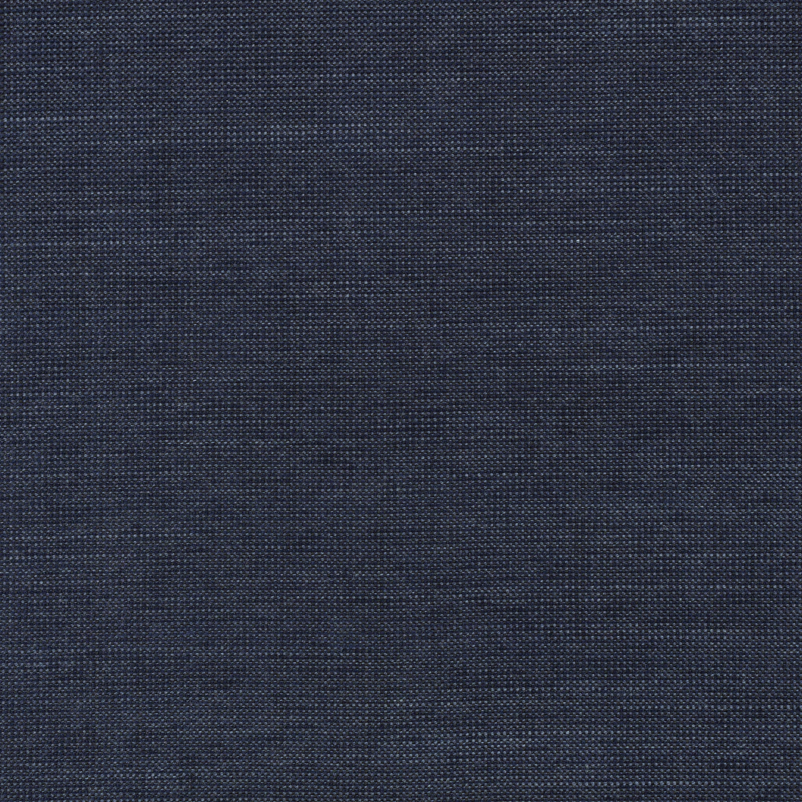 Close-up of dark ink-blue textile with a fine, subtly variegated woven surface