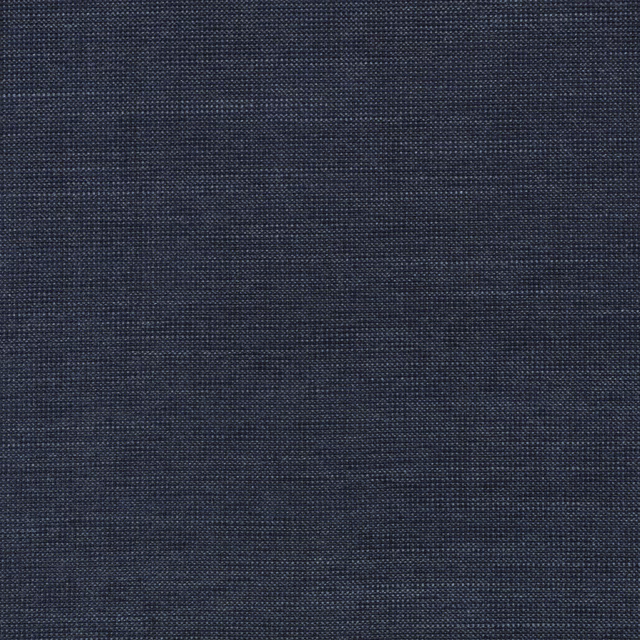 Close-up of dark ink-blue textile with a fine, subtly variegated woven surface