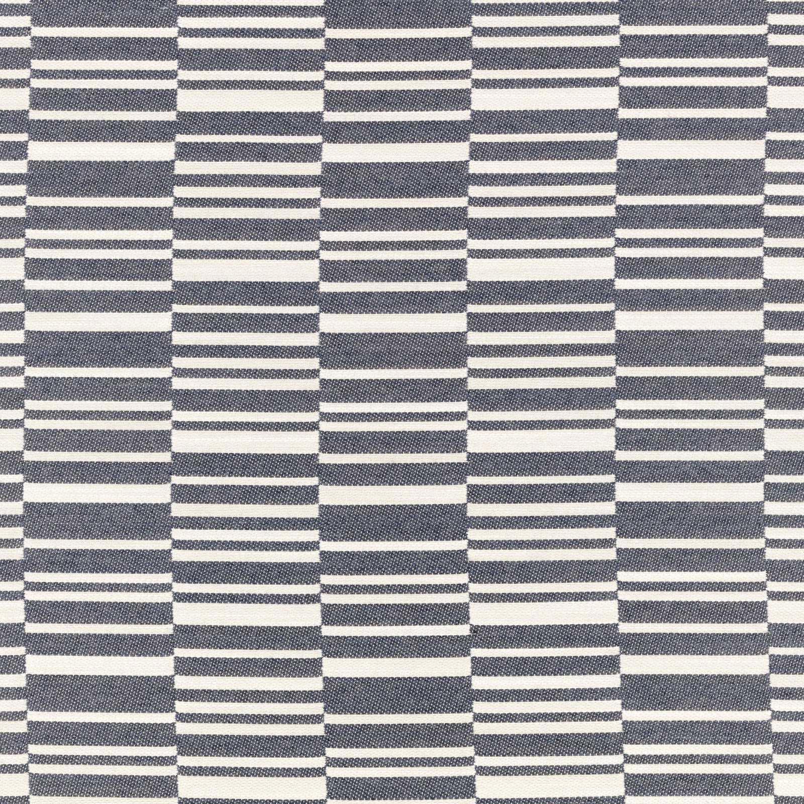 Deep indigo and ivory woven fabric with staggered horizontal geometric bars