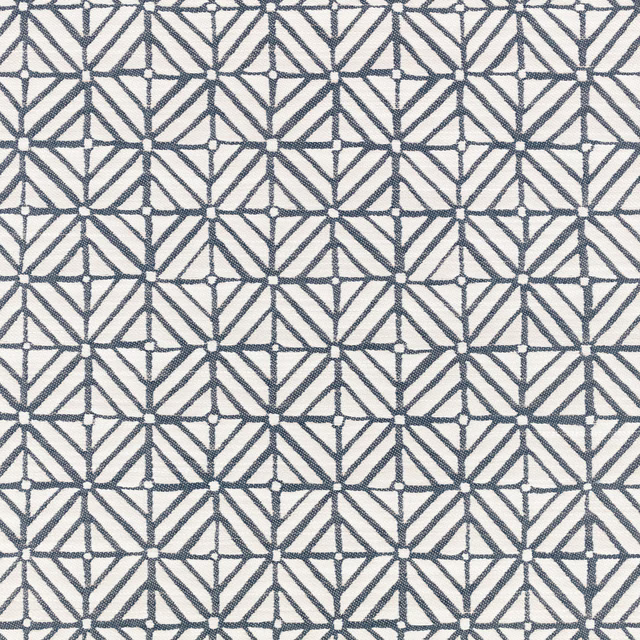 Indigo-blue angular lattice on a softly textured cream ground